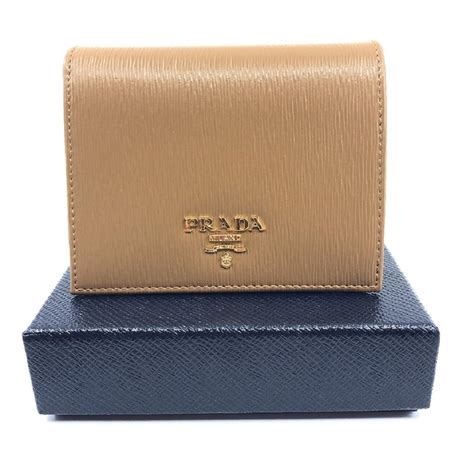 prada vertical flap wallet vitello chrome|More.